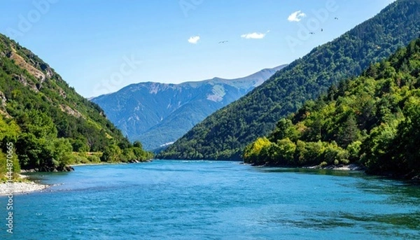 Fototapeta Birds flying over mountain ranges and rivers, vibrant and harmonious nature background