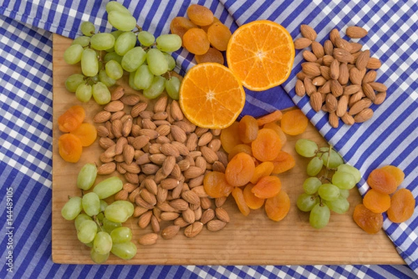 Obraz Healthy raw fruit and nut snack platter