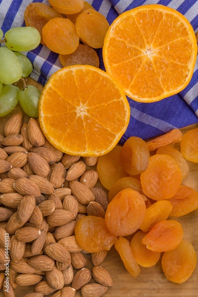 Obraz Healthy raw fruit and nut snack platter