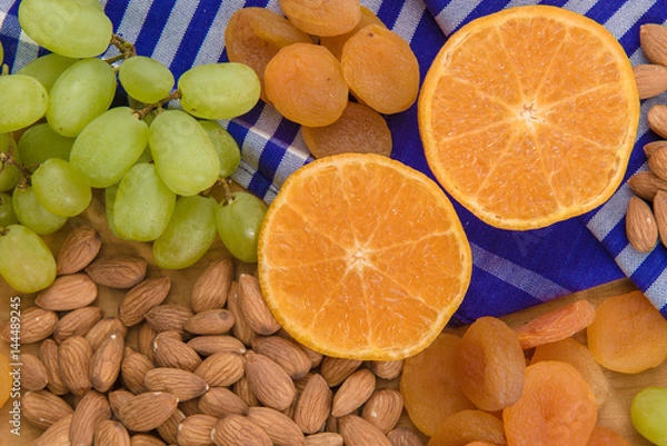 Obraz Healthy raw fruit and nut snack platter