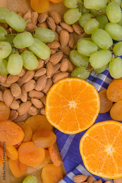 Obraz Healthy raw fruit and nut snack platter