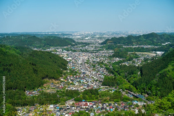 Obraz 山間部の都市景観