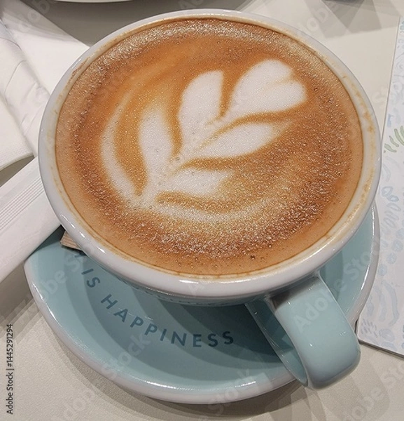 Fototapeta Cup of latte with latte art. Photograph by Artist Nadia Russ.	