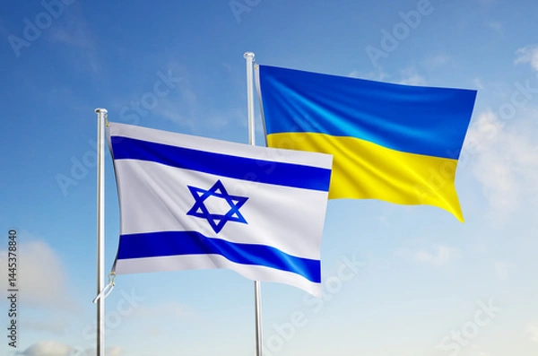 Obraz flags of ukraine and israel over blue sky background.