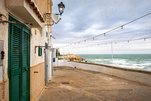 Fototapeta View of the Italian town of Vieste during a storm and cloudy weather. Sad atmosphere of the popular holiday destination Vieste.