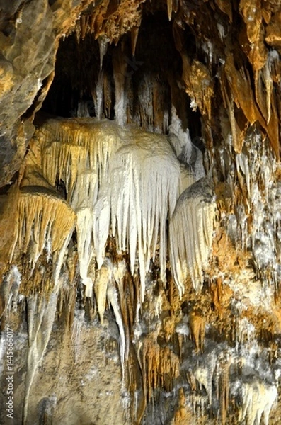 Obraz Inside of beautiful old dark cave with many stalactites. Grotte di Is Zuddas, Italy, Sardinia