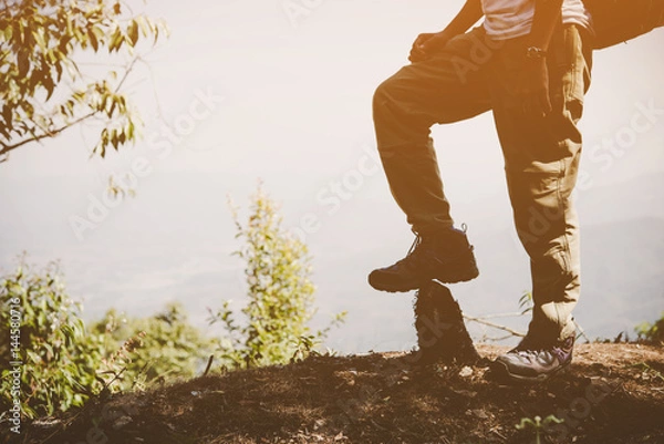 Obraz Close up of woman traveler with backpack on mountain landscape. Travel concept.