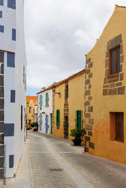 Obraz Colorful Traditional Street in Gran Canaria Old Town, Charming narrow street with colorful buildings and stone architecture in a historic.