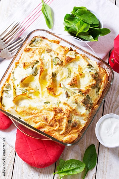 Fototapeta Traditional Bulgarian or Balkan pie banitsa made from filo dough, cream cheese and spinach.