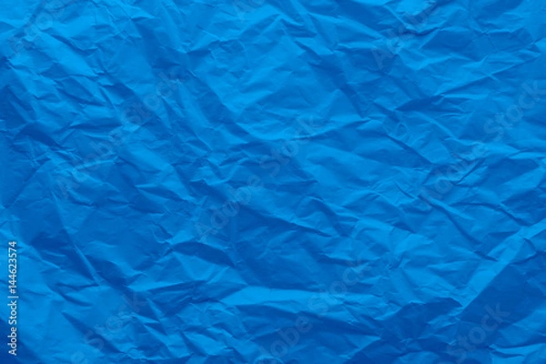 Obraz Background of a crumpled blue paper