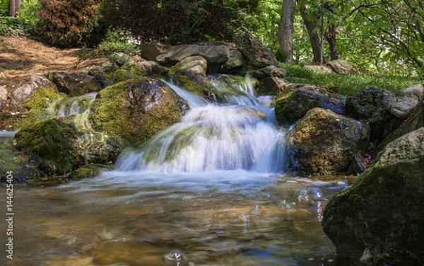 Fototapeta Stream running over the rocks