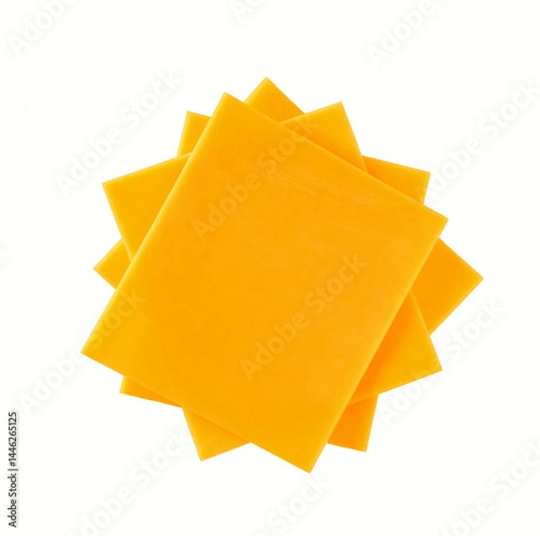 Fototapeta Stack of cheddar cheese slices, sliced natural cheese cheddar isolated on a white background, top view.