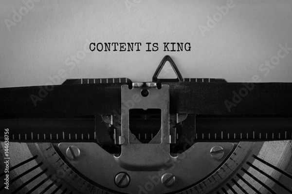 Fototapeta Text Content is King typed on retro typewriter