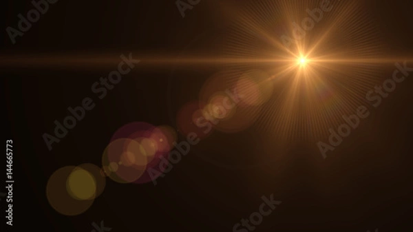 Fototapeta Lens Flare light over Black Background. Easy to add overlay or screen filter over photos	