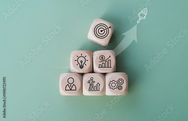 Fototapeta Rocket launching from wood cube with business icon, Start-up, Creativity, Big idea, Business goals management, Investment on new project to wealth, Company strategy target, Sustainable financial plan