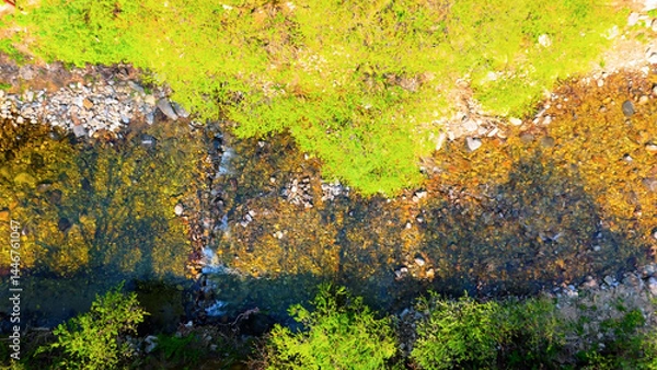 Fototapeta A view of a valley in early summer colored with green light. A beautiful natural view of Sillim, Gangwon Province, Korea's attraction, taken with a drone in the sky. A trip to Gangwon Province