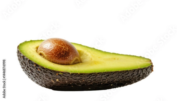 Obraz A close-up reveals a halved avocado, showcasing its creamy green flesh and large brown seed against a stark transparent background.  The avocado's textured skin is clearly visible.