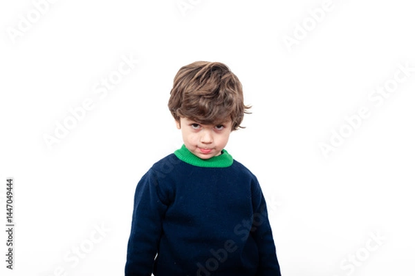 Fototapeta Child with playful expression in simple setting