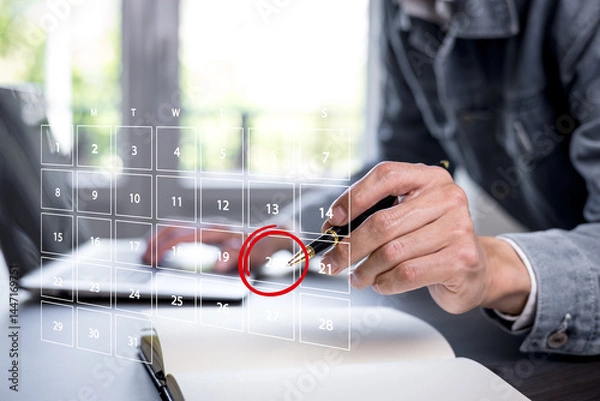 Fototapeta Businessman manage time for effective work. appointment reminders and meeting agenda on the calendar. Time management concept.Calendar on the virtual screen interface.