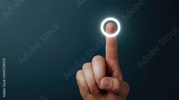 Fototapeta A hand presses the glowing start button, with the index finger activating the power symbol, sparking the beginning of a new business project or digital startup.
