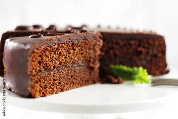 Obraz Chocolate Sacher torte on white background. Selective focus.