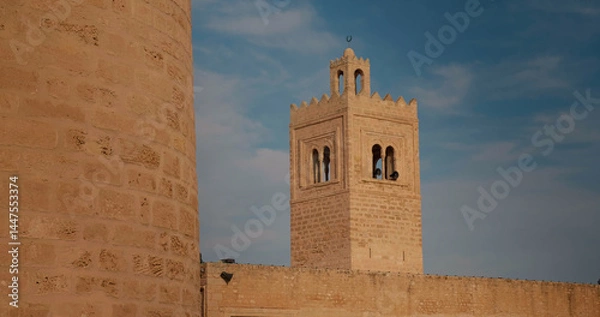Fototapeta Tower of great Moslem Mosque on fortress Ribat in Monastir. Ribat of Monastir protective walls and the tower.