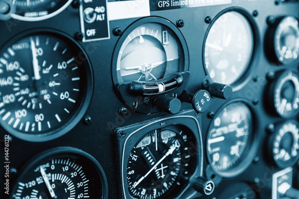 Fototapeta Cockpit helicopter - Instruments panel. Interior of helicopter control dashboard, Heli on the ground.