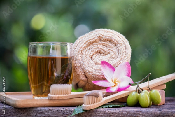 Obraz Neem leaf decoction can be used as a mouthwash and as an ingredient in toothpaste on natural background.