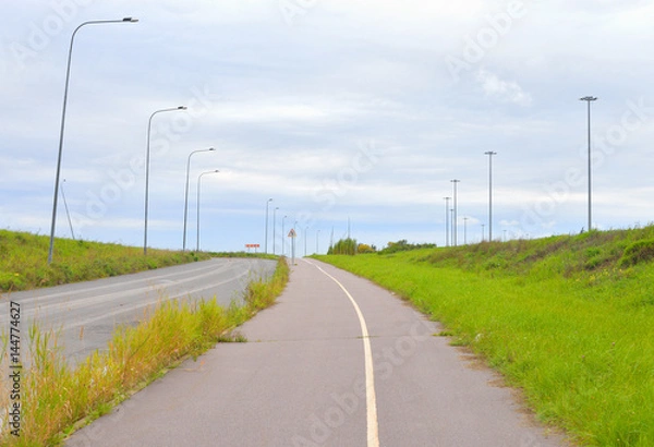 Obraz Bike path at summer cloud day.