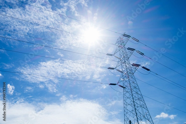 Fototapeta High voltage post, High voltage tower at blue sky background