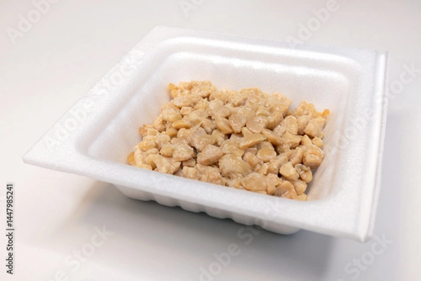 Obraz Crushed natto (fermented soybeans) in a pack