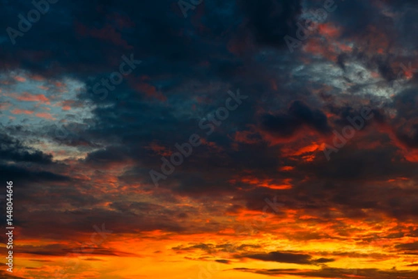 Obraz Orange, red and black clouds in the sunset sky