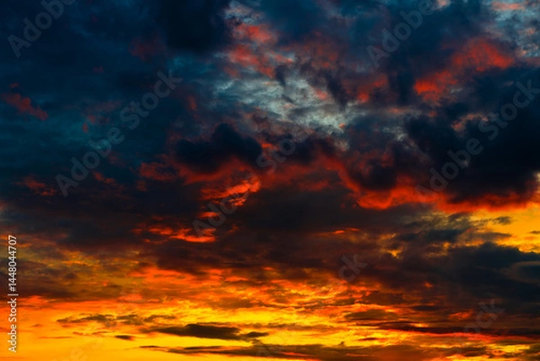Obraz Orange, red and black clouds in the sunset sky
