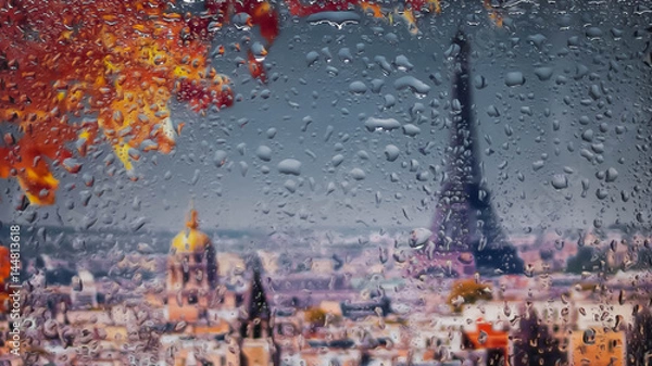 Fototapeta PARIS, FRANCE. A view of the city from a window from a high point during a rain. Rain drops on glass. Focus on drops