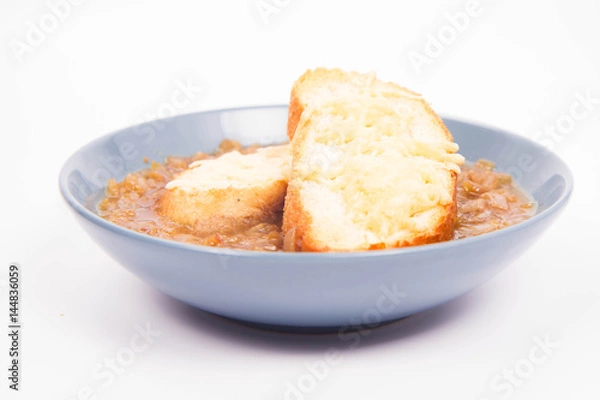 Obraz Onion soup with toast on a white background