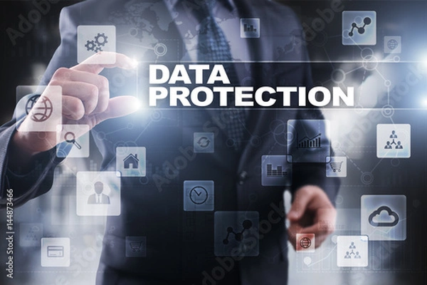Fototapeta Businessman selecting data protection on virtual screen.