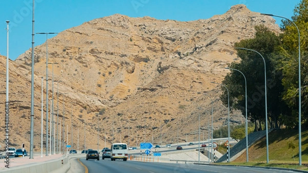 Fototapeta A picture of the city of Muttrah in the Sultanate of Oman, which features two historic castles from ancient times. High quality photo
