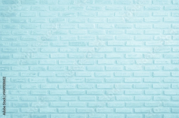 Obraz Brick wall painted with pale blue paint pastel calm tone texture background. Brickwork and stonework flooring interior rock old pattern clean concrete grid uneven bricks design stack backdrop.