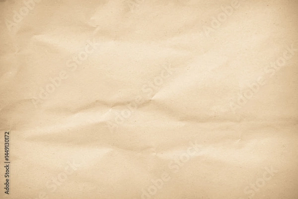 Fototapeta Old paper vintage texture surface for background. Recycle pale brown paper crumpled texture, Cream color recycled kraft paper texture blank with copy space for text.