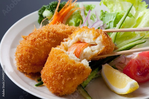 Obraz Fried breaded crab meat with cheese on dish