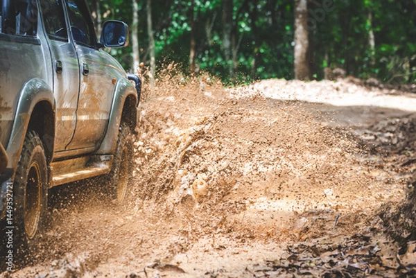 Obraz  Offroad car. 4x4 off-road suv car stuck in mud. Adventure travel concept background.