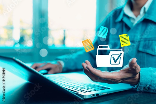 Fototapeta Businessman working on laptop with virtual screen. Online documentation database, IT consultant being set up Virtual Document Management System with a laptop, Software for archiving corporate files.
