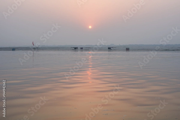 Obraz sunrise over the river Ganges, Varanasi.