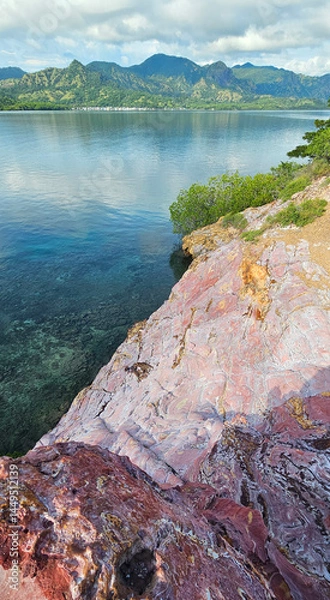 Fototapeta Unique stone texture of the pink rock mountain on the island of the Komodo national park, Indonesia