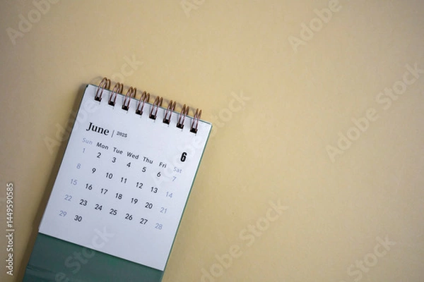 Fototapeta Hello, June. The planning calendar for June 2025 is on the desktop.
