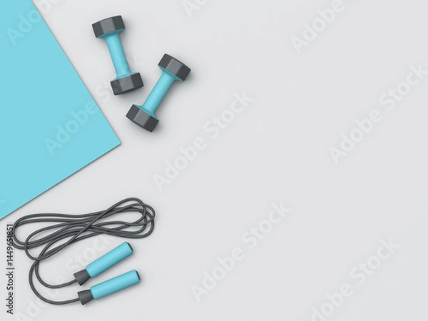 Fototapeta Blue fitness mat, dumbbells and jumping rope isolated on gray background. Top view. Clipping path included
