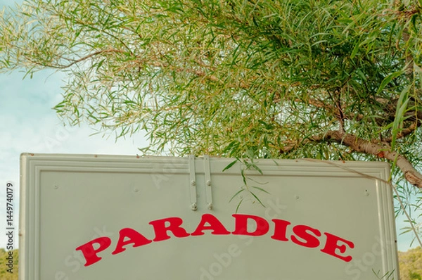 Fototapeta paradise sign on the back of a lorry