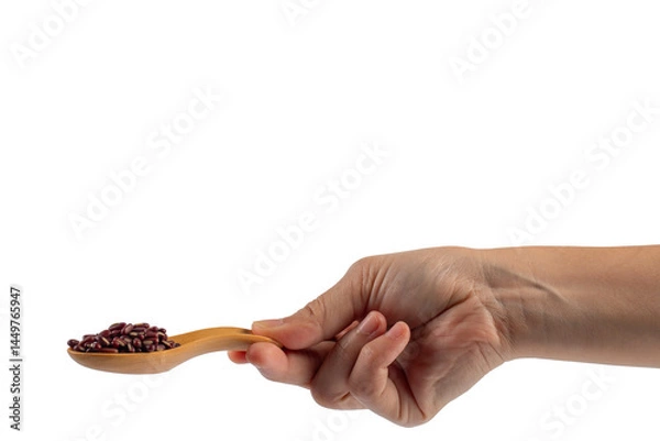 Fototapeta Red beans isolated on spoon wooden in hand on transparent background