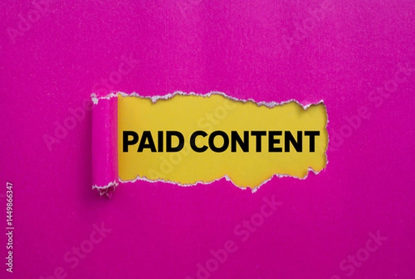 Fototapeta Paid content message written on ripped torn pink paper on yellow background. Conceptual paid content symbol. Copy space.