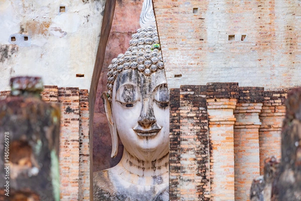 Obraz Sukhothai budha statue at si chum temple of Sukhothai historical park of Sukhothai province, Thailand, Asia.